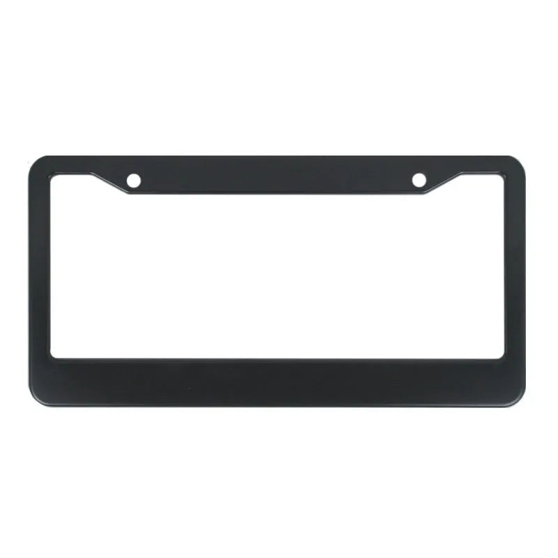 Minimalist black aluminium alloy car licence plate frame with slotted holes on a white background.