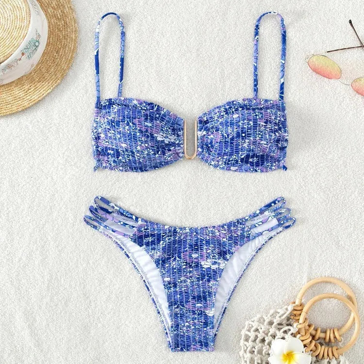 Women's floral high-waist bikini swimsuit set in solid blue colour with matching bra.