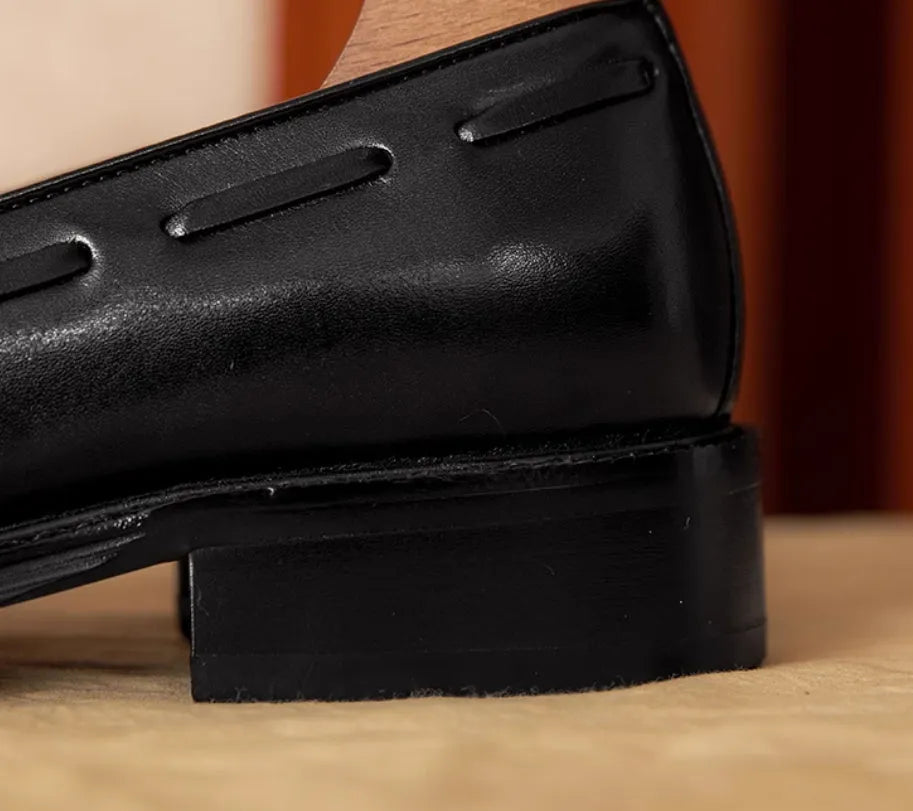 Men's black genuine leather fringed slip-on loafers with rubber soles and British styling