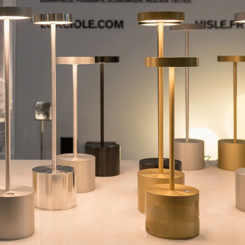 All-aluminium rechargeable LED desk lamp with touch dimming control in silver finish