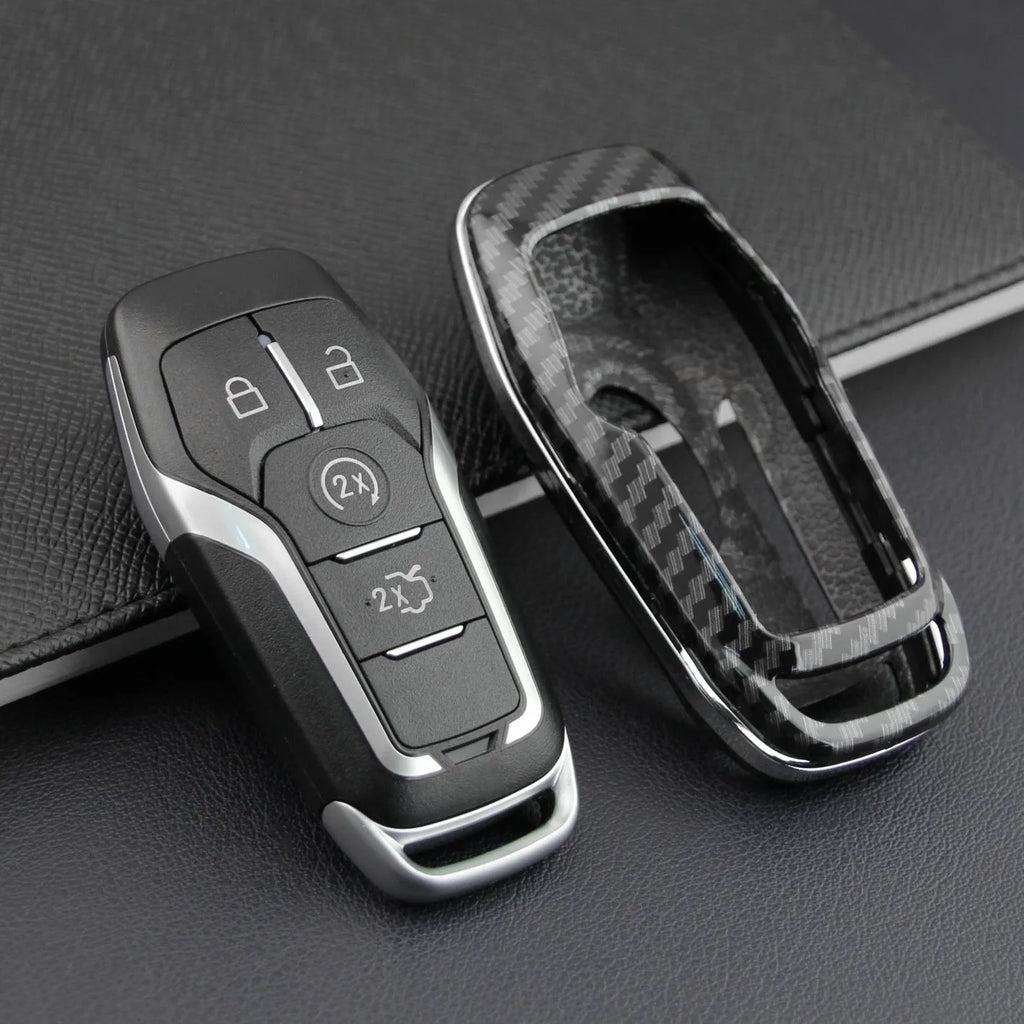 Remote control protective shell for car keys in plastic, showing single shell and buckle variants