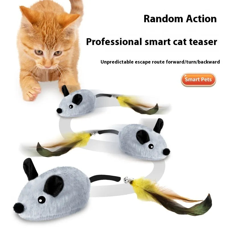 Grey charging mouse cat toy with double feather tail decoration on floor
