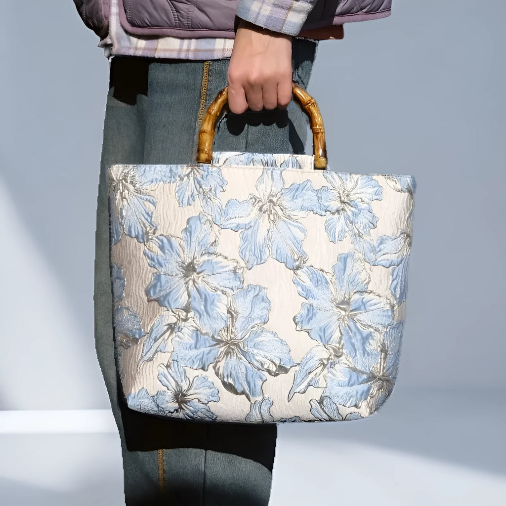 Light blue canvas shoulder bag with bronzing flower pattern and double adjustable straps
