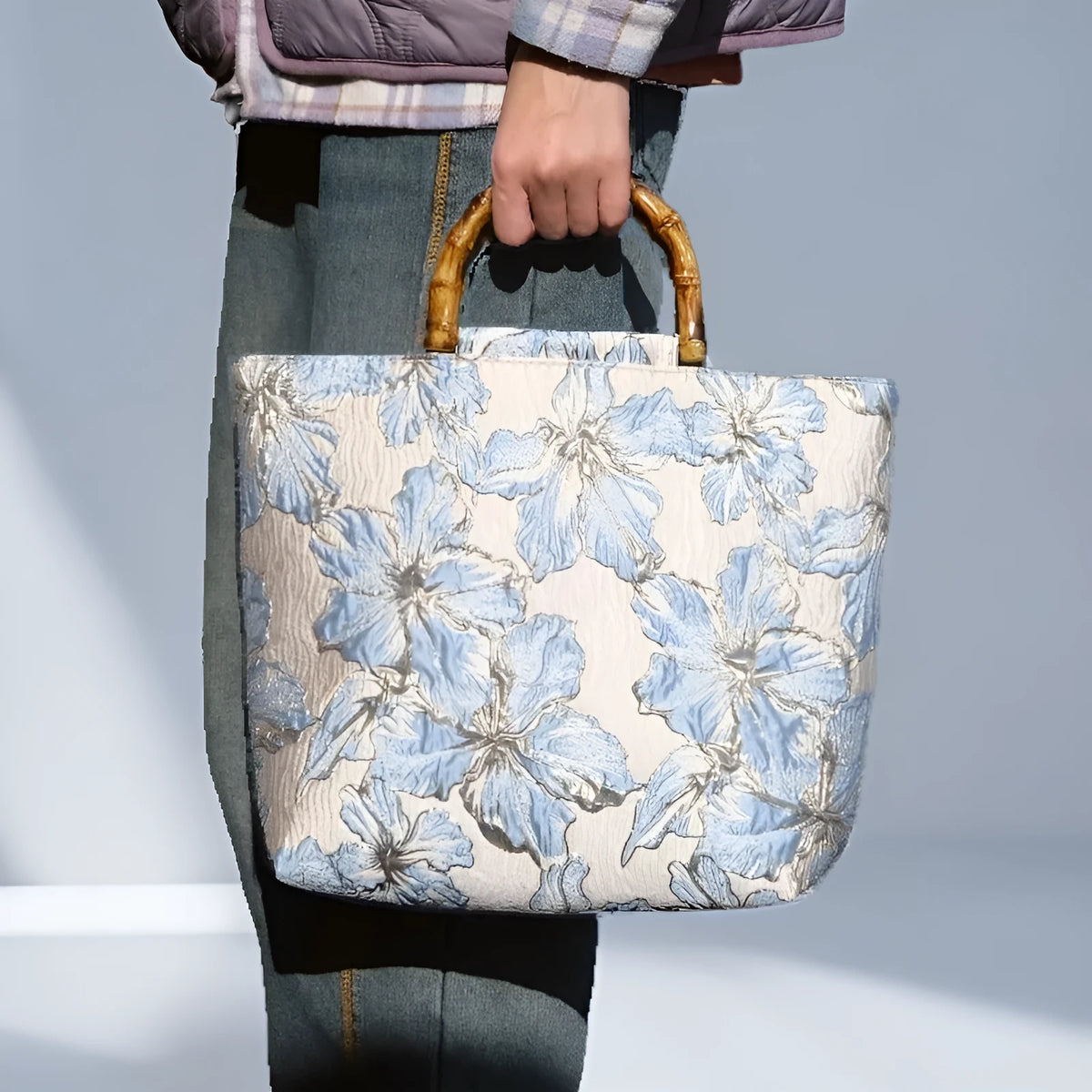 Light blue canvas shoulder bag with bronzing flower pattern and double adjustable straps