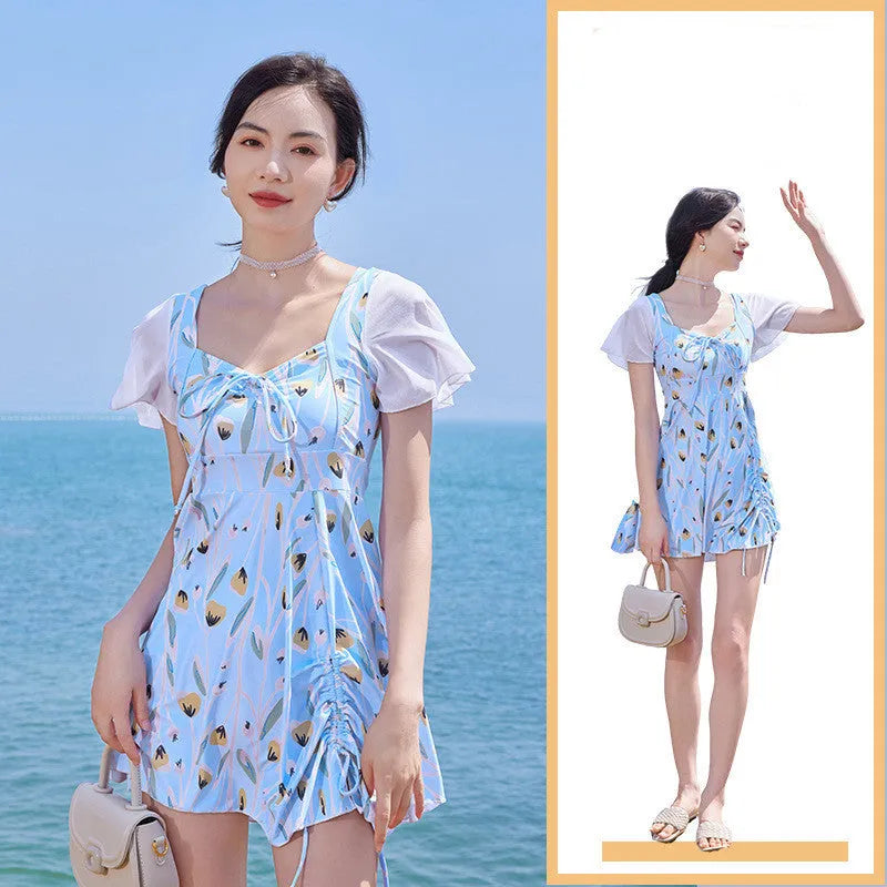 Women's one-piece swimsuit with floral pattern in sea salt blue colour for swimming