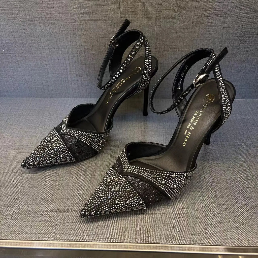 Women's hollow high heels with stiletto heel, pointed toe, and red sole in silver and black colours