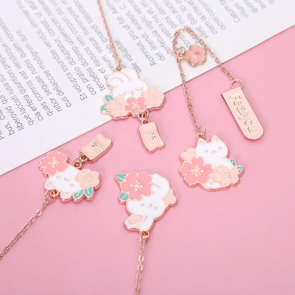 Creative cartoon metal pendant book holder with cherry blossom cat design for journal decoration.