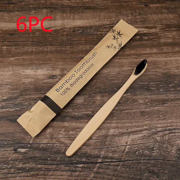 Set of 10 bamboo toothbrushes with charcoal bristles in various colours showing 17.5cm handles