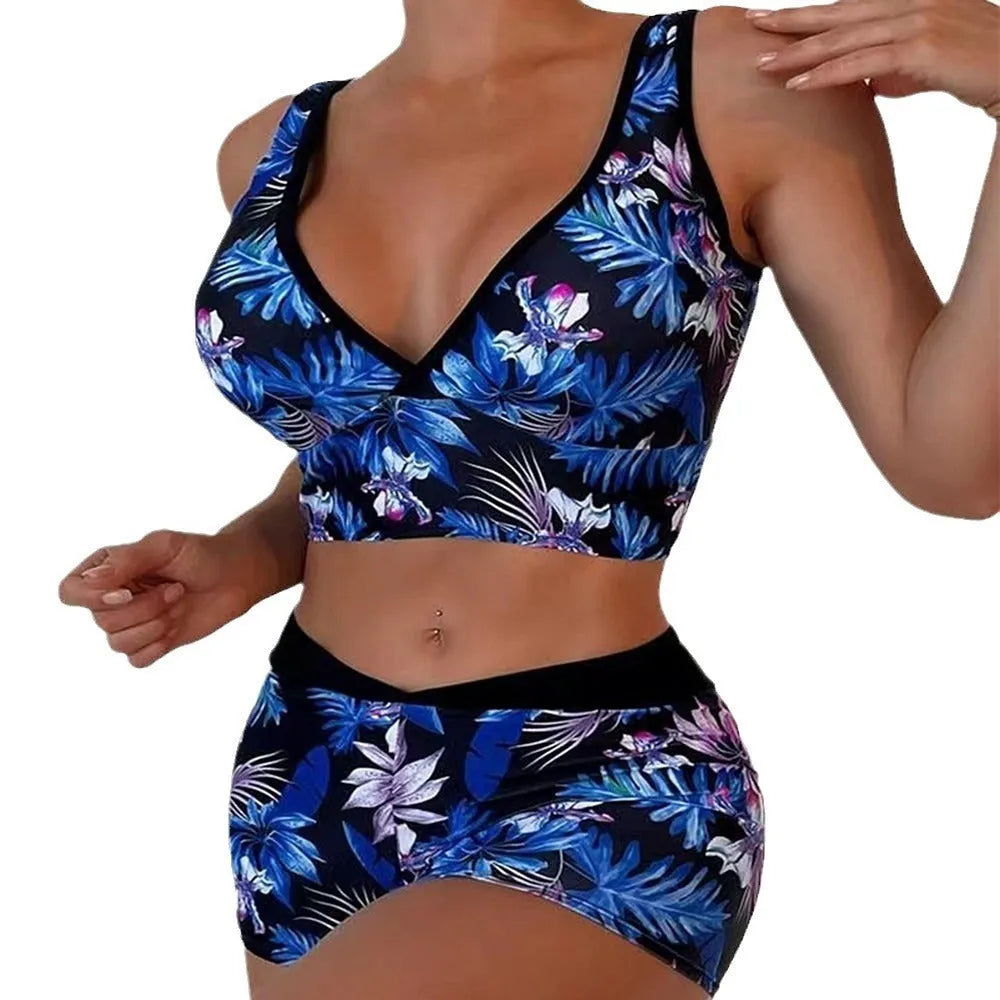 Two-piece swimsuit with printed boxer briefs in multiple colours, sleeveless top, and briefs style for female swimmers