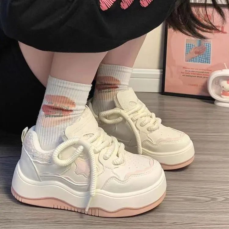 Women's green and pink artificial PU platform sneaker with front lace-up and round toe.