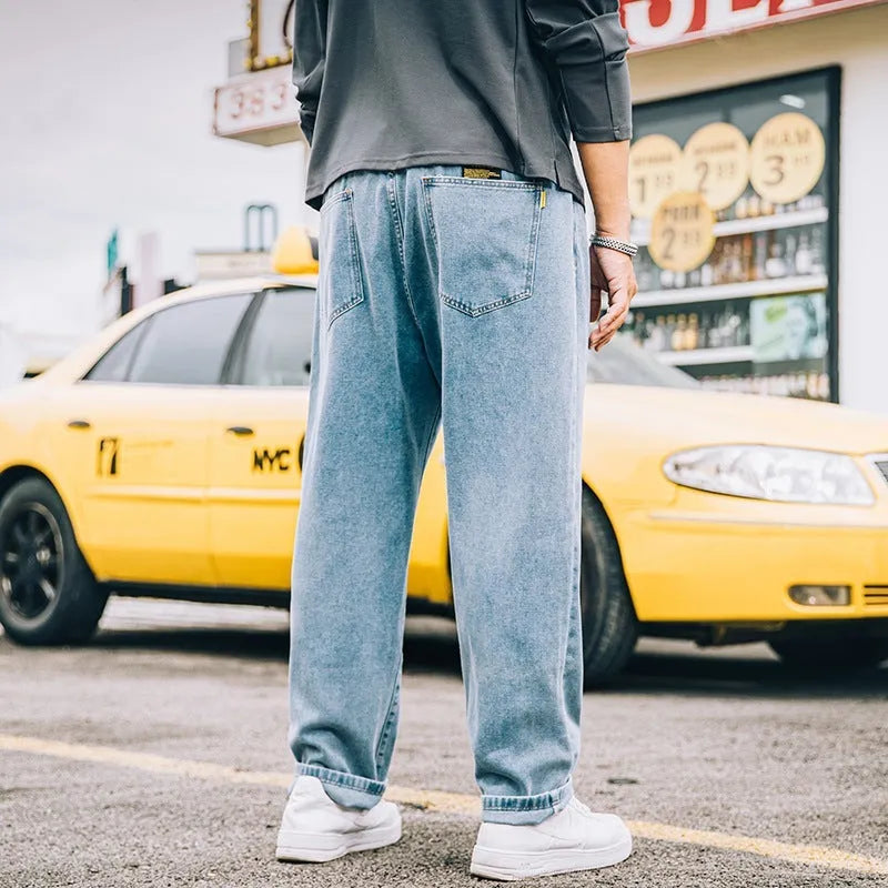 Men's loose straight jeans in dark blue cotton with mid-waist fit and straight leg cut