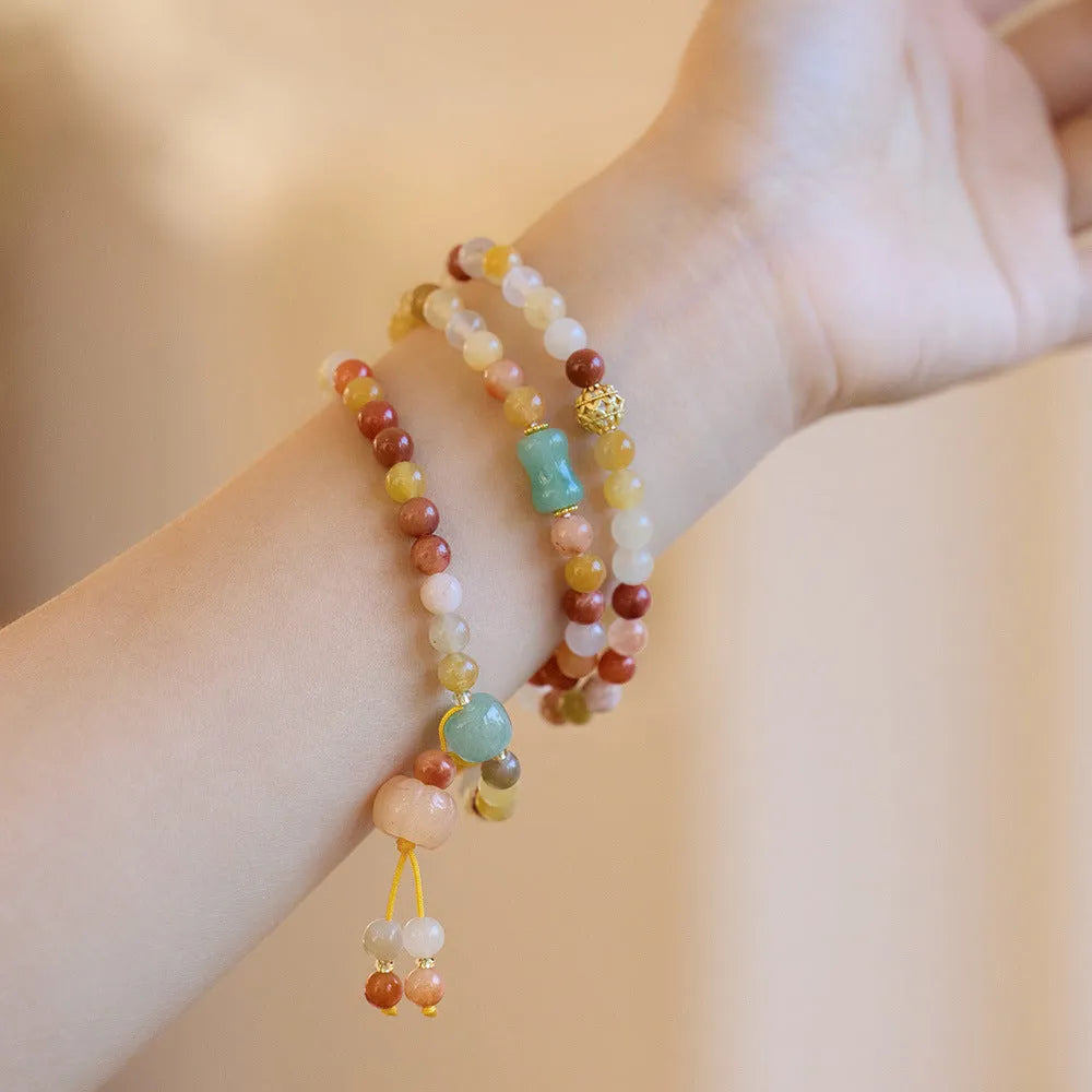 Women's three-circle pumpkin tassel jade bracelet with Jinsi Jade stones and handcrafted construction