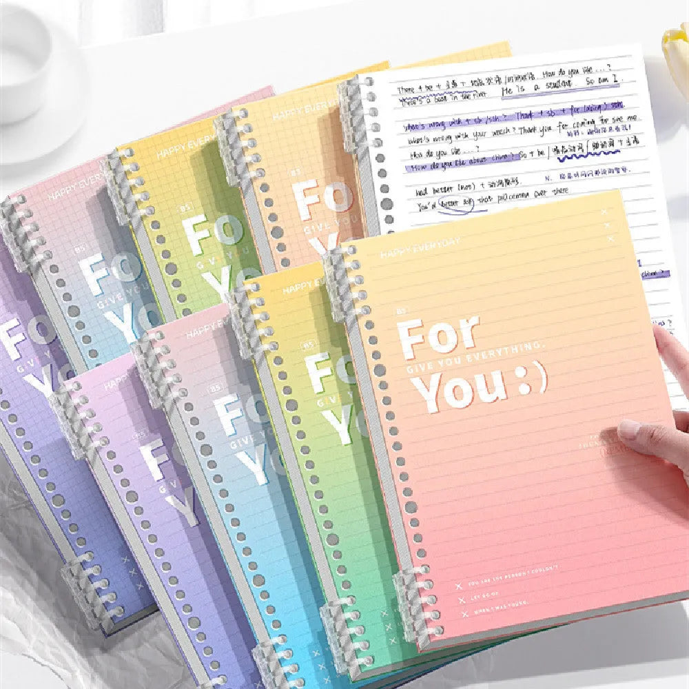 Removable coil notebook with gradient colour design showing A4 and B5 size options with wood-free paper