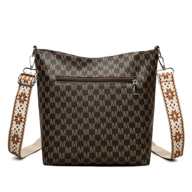 Retro dumpling-shaped PU shoulder bag in black, brown, or white with zipper change pocket