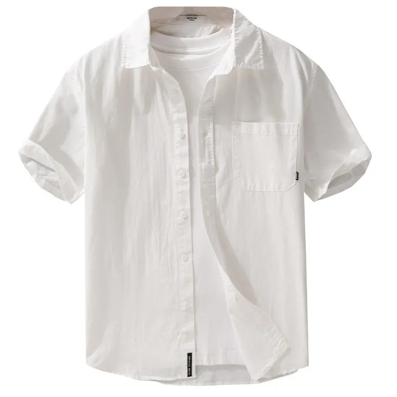 Men's light blue loose-fit short sleeve cotton shirt on a hanger.