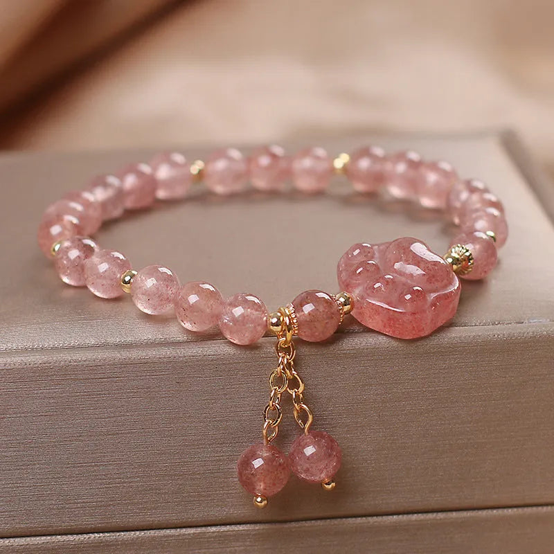 Women's double layer strawberry quartz bracelet with lucky cat charms in red cat's eye flowers colour
