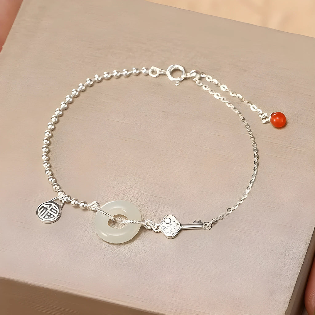 Women's 925 silver bracelet with Hetian jade elements in Chinese style geometry design