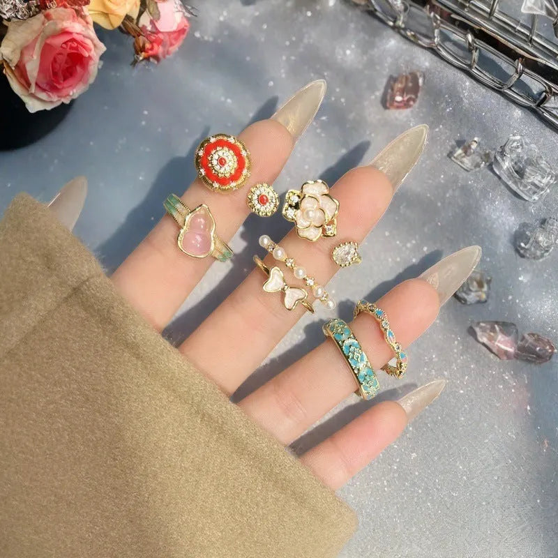 Adjustable copper ring with vintage oil-dripping gourd design, inlaid zircon stones, and flower and bow shapes in New Chinese style