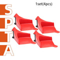 Set of four bright red plastic triangle parking blocks with a non-slip rubber surface.