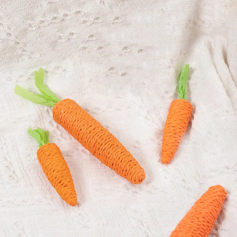 Interactive cat toy set with carrot-shaped toys, crinkle paper, ringing stones, extendable stick, and dental care chewing sticks