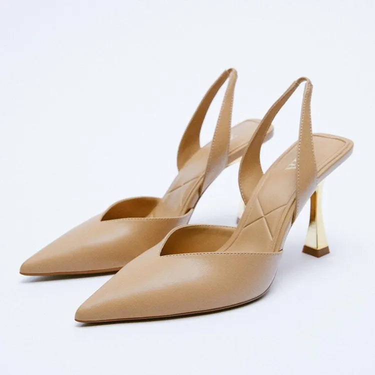 Women's pointed high heels in patent leather with shallow mouth design, available in black and apricot colours