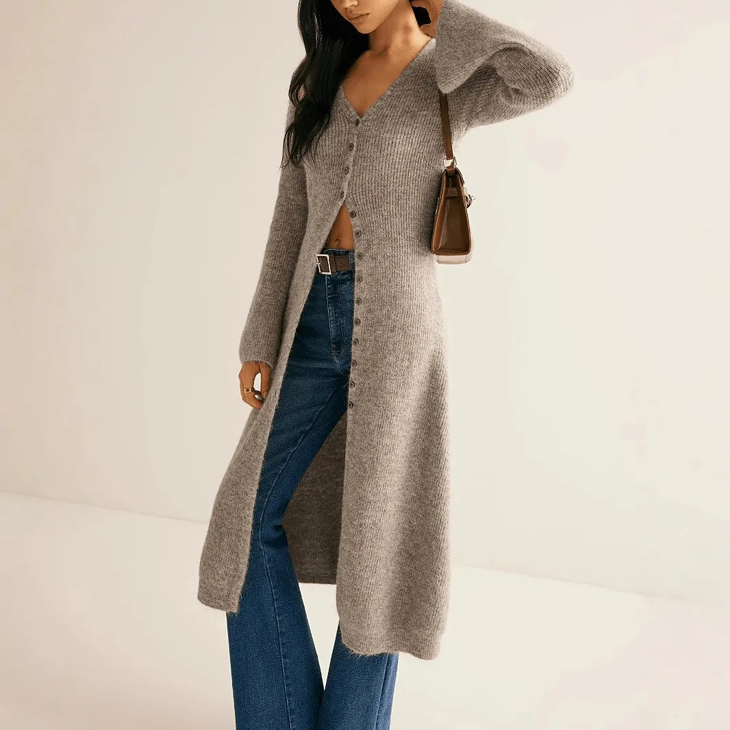Khaki coloured women's long sleeve button-front cardigan coat on a hanger.