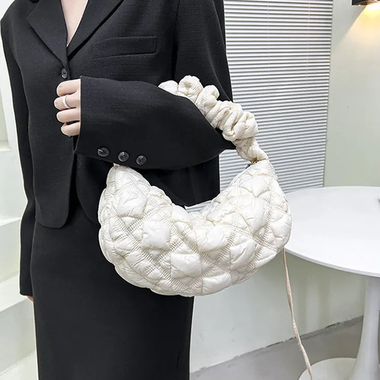 Women's nylon underarm bag in beige colour showing 35cm width and adjustable 120cm shoulder strap