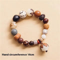 Geometric Bodhi seed bead bracelet with 18 beads on a wrist, showing a 16cm unisex fit.