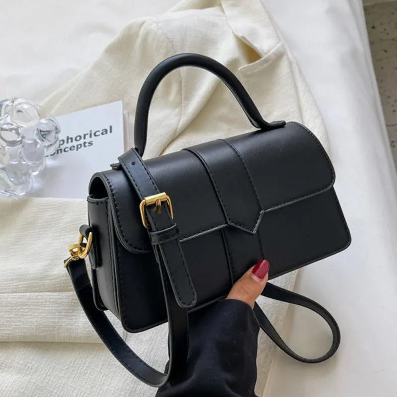 Women's beige messenger bag with 22cm width showing file compartment and exterior pocket