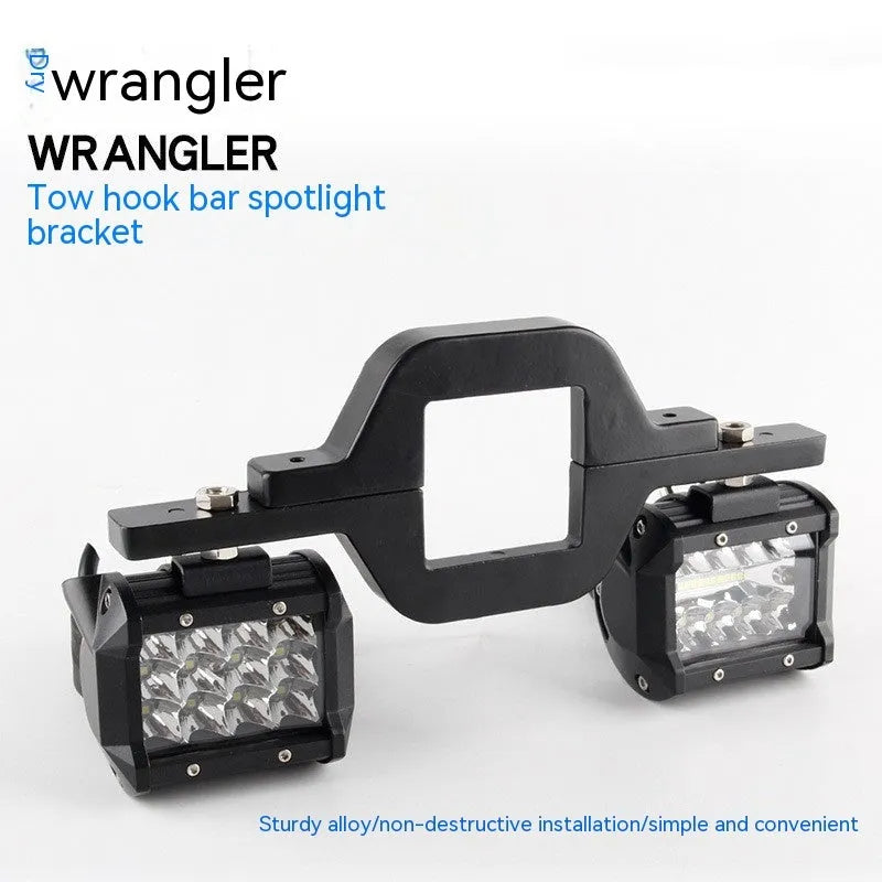 Black aluminium alloy LED light mounting bracket for a Jeep Wrangler off-road vehicle