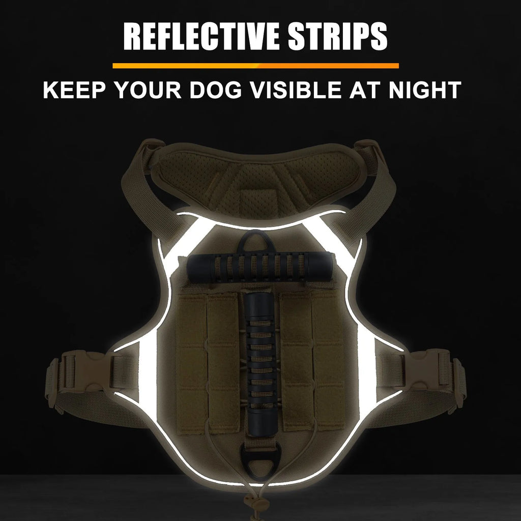 Monochrome tactical dog harness with a back handle and chest strap on a dog.