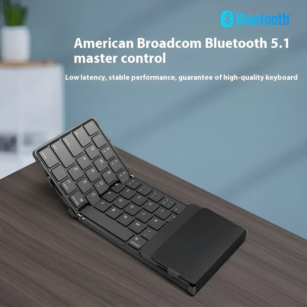 Black folding Bluetooth keyboard for tablets showing touchpad variant with compact folded dimensions