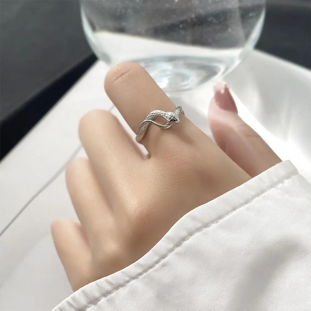 Open snake ring with textured copper band, electroplated in platinum or gold colour