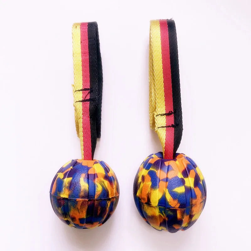 Floating EVA pet training ball in camouflage colour with 7cm diameter measurement shown