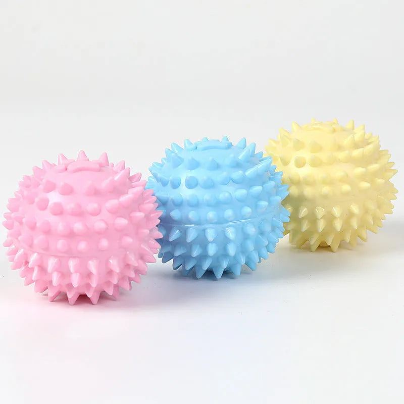 Blue TPR footprint-shaped dog chew toy for tooth cleaning, 6cm in diameter.