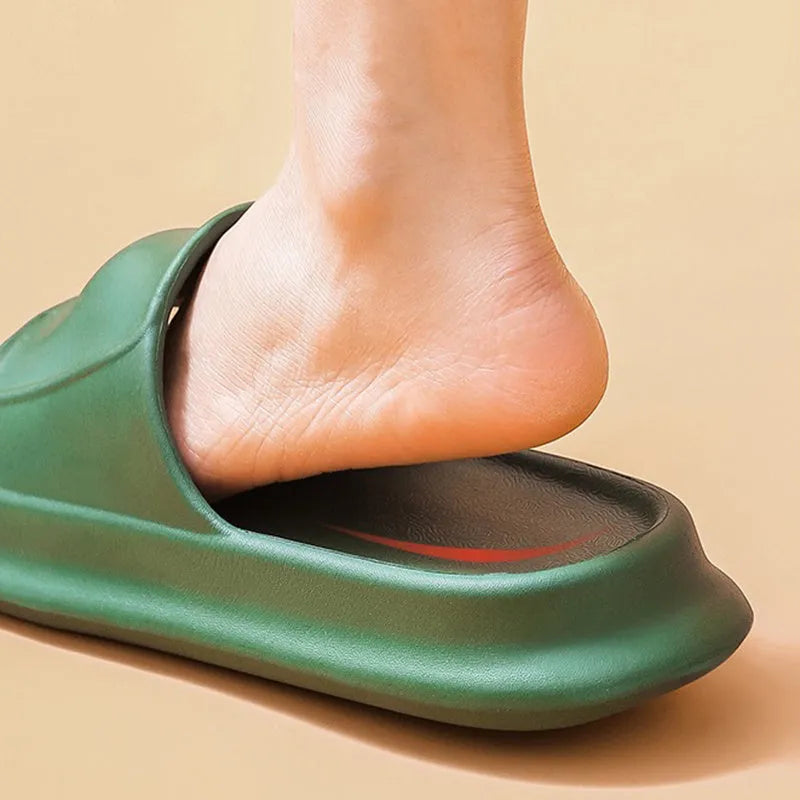 EVA flip-flop slippers with thick sole in multiple colours on a bathroom floor