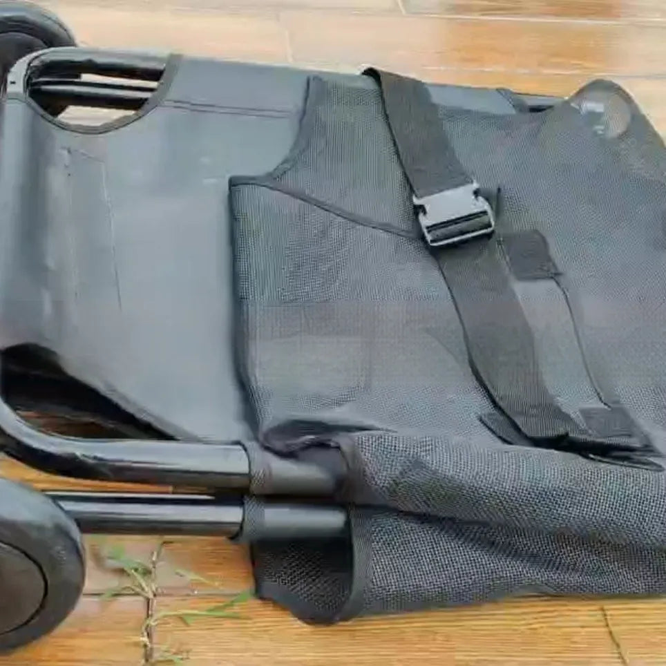 Black foldable aluminium alloy pet stretcher unfolded for emergency dog transfer, showing frame structure and carrying handles