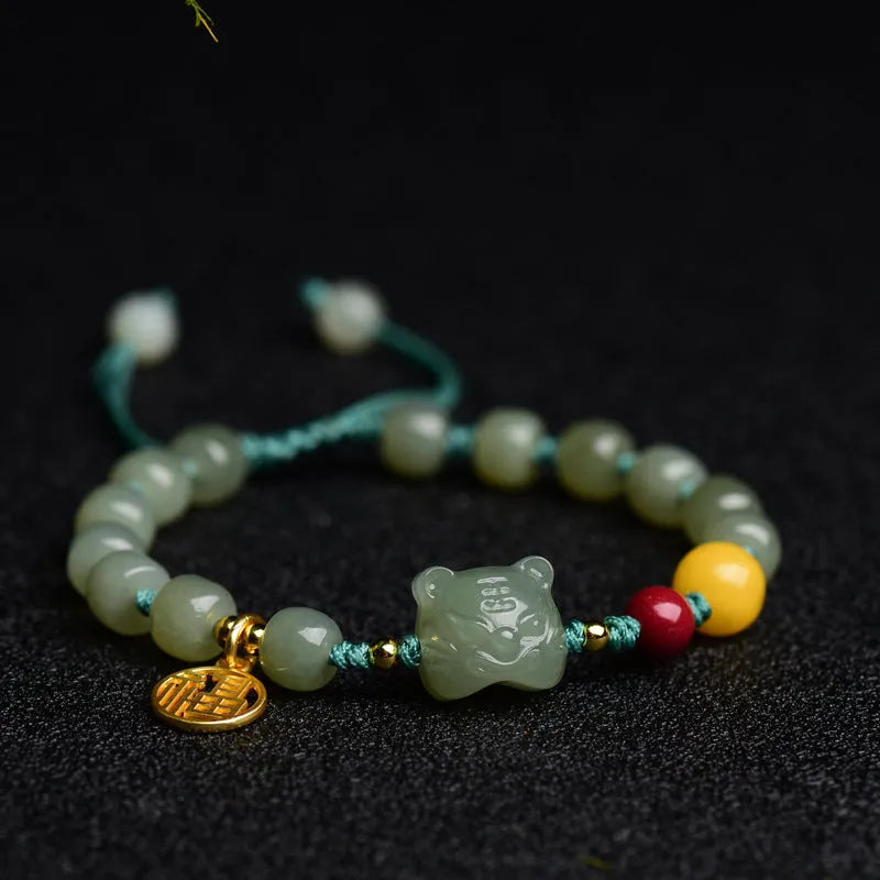Natural Hetian Jade bracelet with animal Zodiac modelling and unset Cinnabar Beeswax beads.