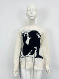 Grey women's alpaca wool pullover sweater with abstract pattern and tassel detail, loose street fashion fit.