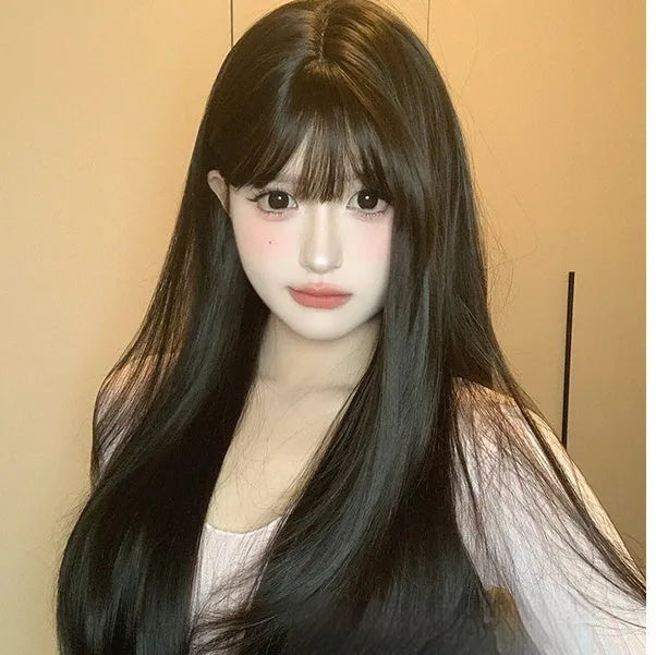 Dark brown women's wig with long straight hair and bangs style on wig head