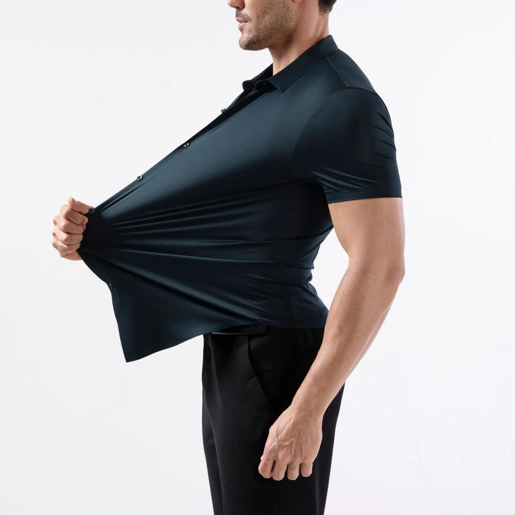 Man wearing a grey short sleeve cardigan-style shirt with four-side elastic, non-ironing fabric.