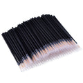 Pack of one hundred black disposable eyeliner brushes with fine points and plastic sleeves