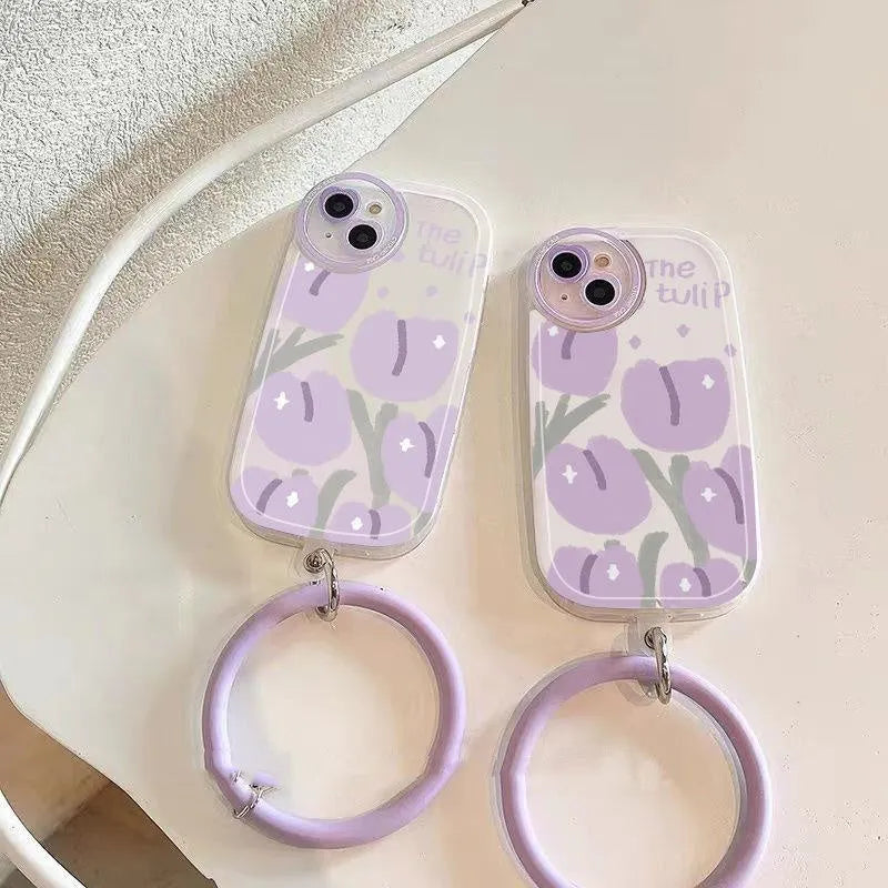 Purple tulip transparent iPhone case with heart-shaped camera detail and matching adjustable bracelet