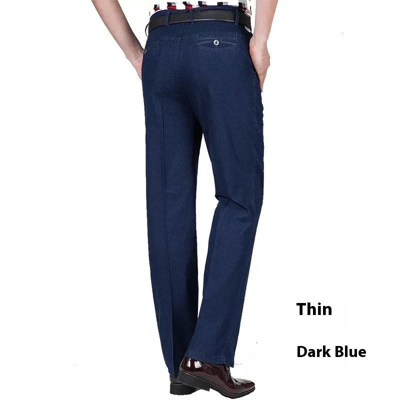Men's high-waist loose blue denim trousers on a neutral background