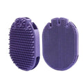 Purple pet shampoo massage brush with soft TPR bristles and ergonomic handle for dog and cat grooming