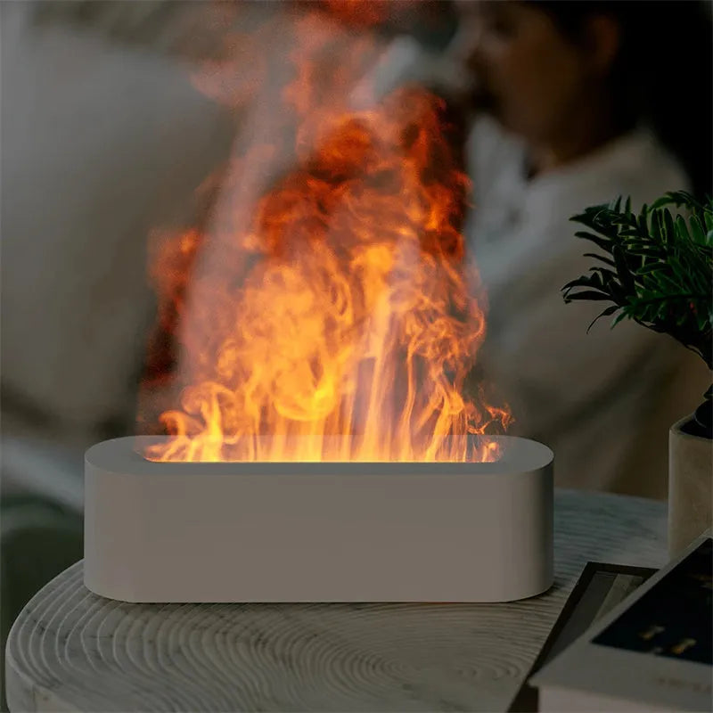 White square DQ709 flame effect aroma diffuser and ultrasonic cool mist humidifier on a table.