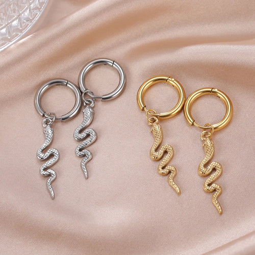 Gold plated stainless steel snake-shaped vintage earrings with detailed scale patterning and clip back closure