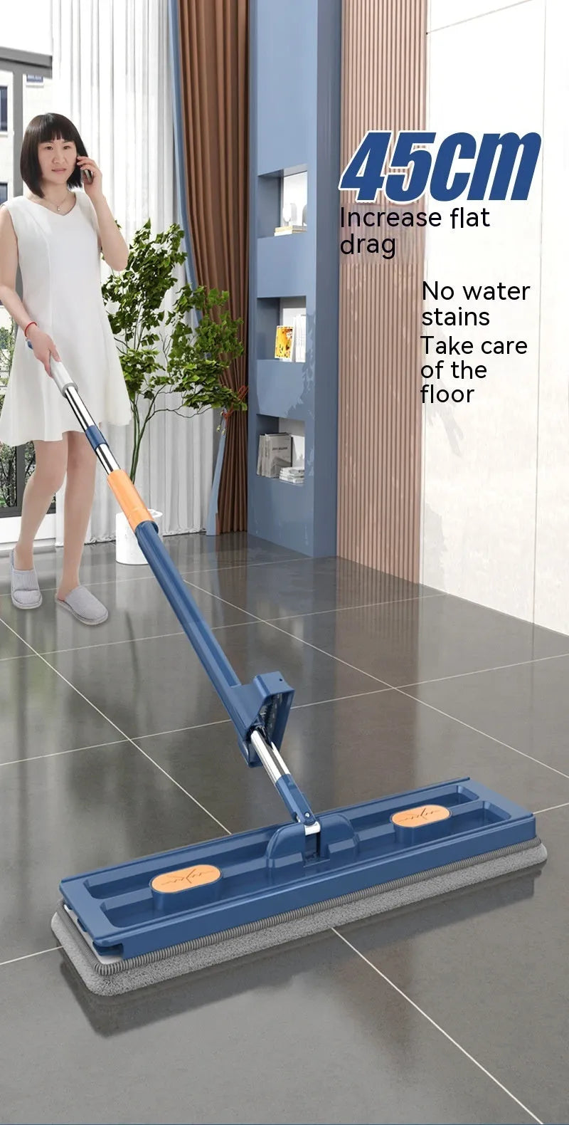 Large flat mop with extended stainless steel handle and rotating head for floor cleaning