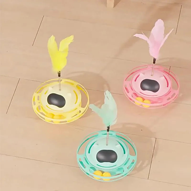 Pink rotating cat toy turntable measuring 17cm by 10cm for feline play and exercise