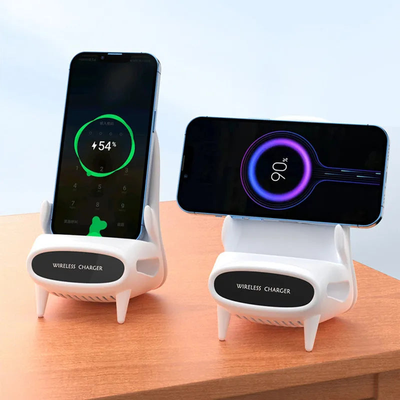 White mini chair shaped wireless charging stand holding smartphone on desk
